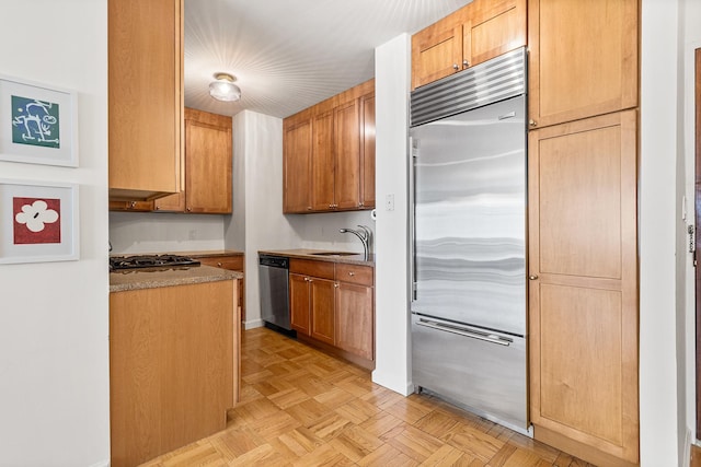 303 E 57th St Unit 6F, New York City, NY 10022 - kitchen featuring stainless steel appliances and a sink