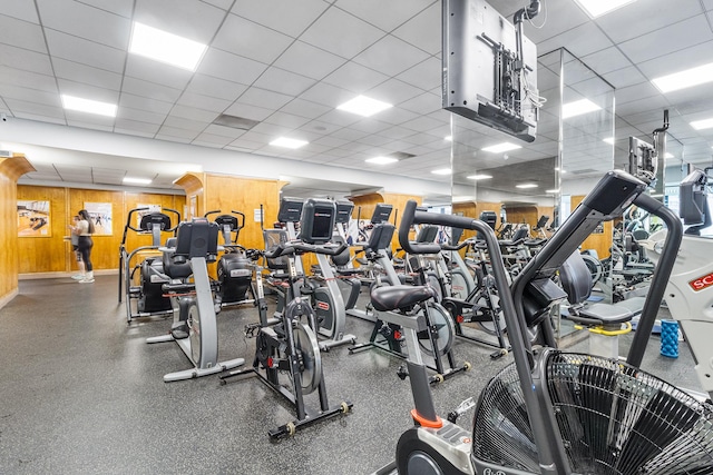 303 E 57th St Unit 6F, New York City, NY 10022 - workout area with wood walls and a drop ceiling