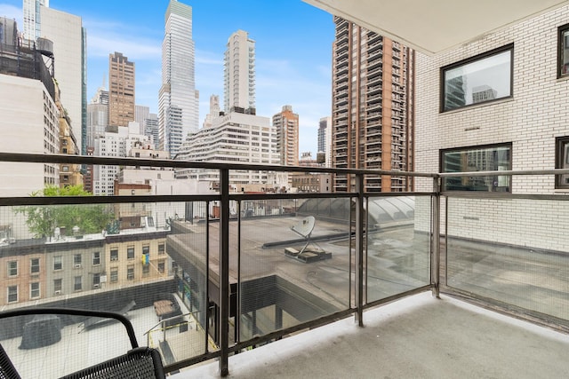303 E 57th St Unit 6F, New York City, NY 10022 - balcony featuring a skyline view