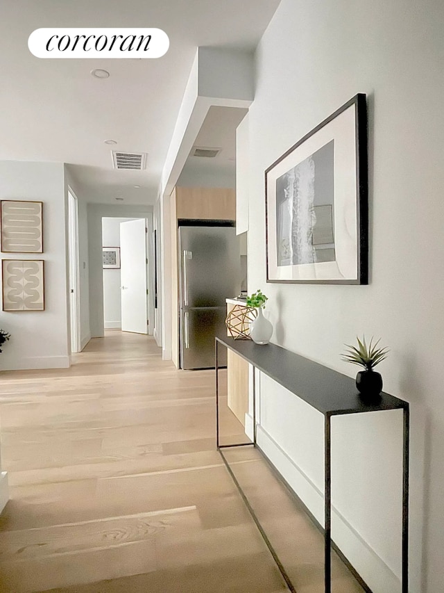 1173 Rogers Ave Unit 5C, New York City, NY 11226 - hallway featuring light wood-style flooring
