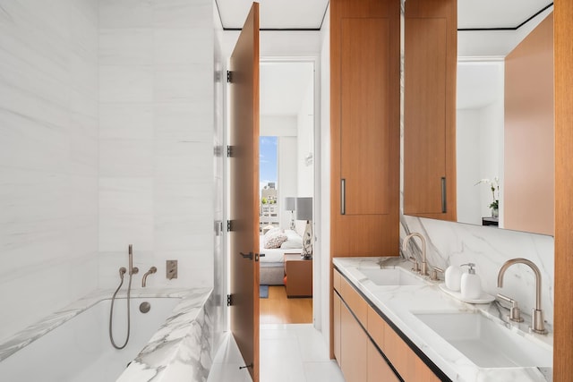 15 E 30th St Unit 21C, New York City, NY 10016 - ensuite bathroom featuring double vanity and a garden tub