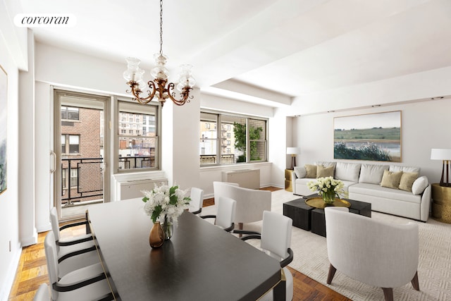 dining space featuring a chandelier