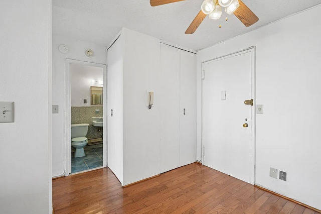 1655 Flatbush Ave Unit C2105, New York City, NY 11210 - unfurnished bedroom with wood finished floors, a closet, ensuite bath, and ceiling fan