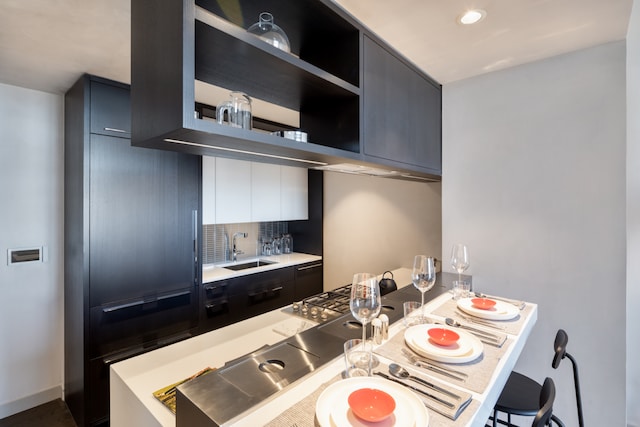 252 S St Unit 63G, New York City, NY 10002 - kitchen featuring a sink, modern cabinets, light countertops, open shelves, and recessed lighting
