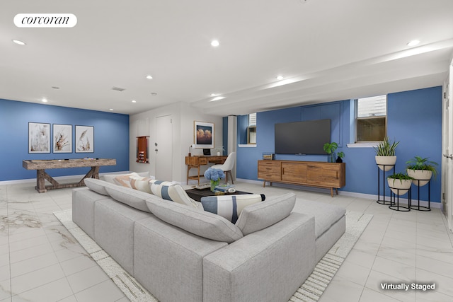 195 Bch 125th St Unit 1C, New York City, NY 11694 - living room featuring recessed lighting, baseboards, and marble finish flooring