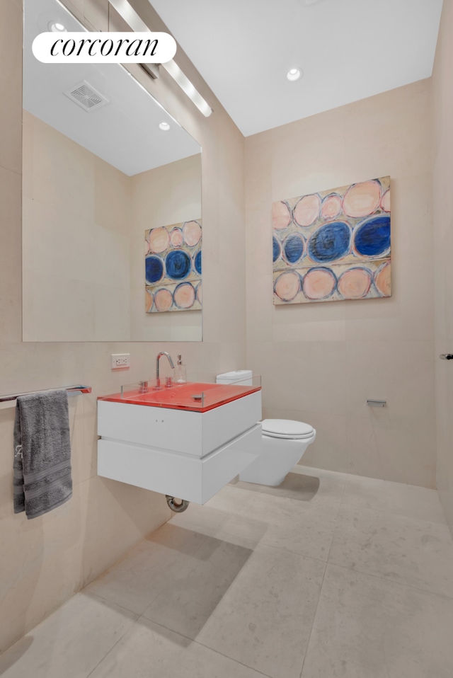 133 W 14th St Unit 2A, New York City, NY 10011 - bathroom featuring toilet and tile patterned floors