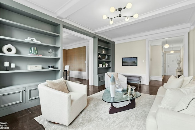 living room featuring built in features, a chandelier, crown molding, dark wood-type flooring, and beam ceiling