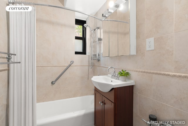 139-15 83rd Ave Unit 127, New York City, NY 11435 - full bath with tub / shower combination, tile walls, and vanity