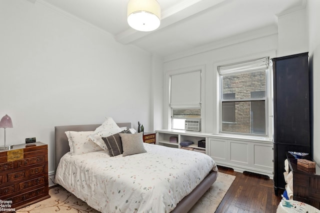 bedroom with crown molding, wood finished floors, and cooling unit
