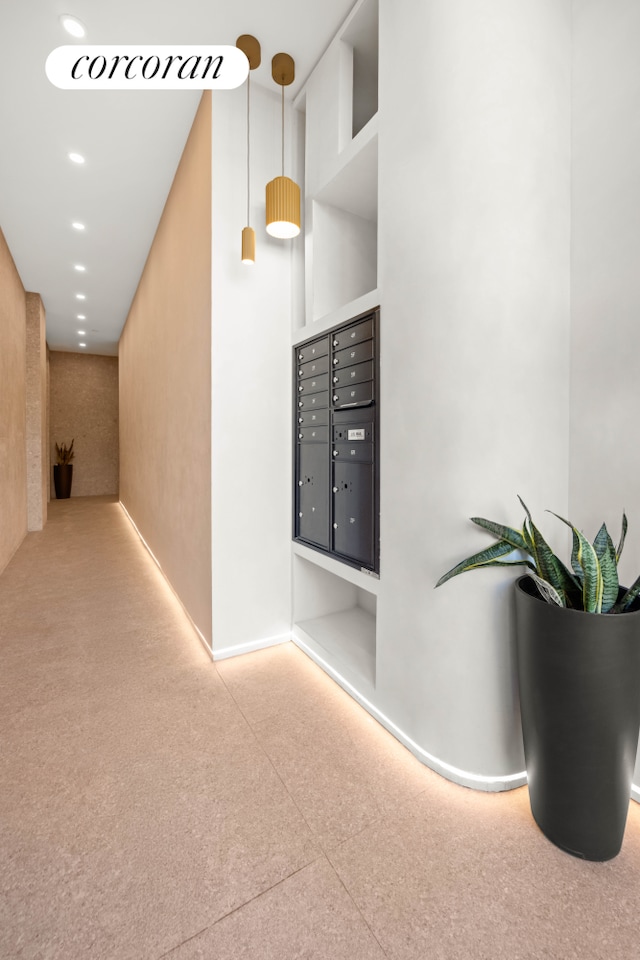 hallway featuring mail area