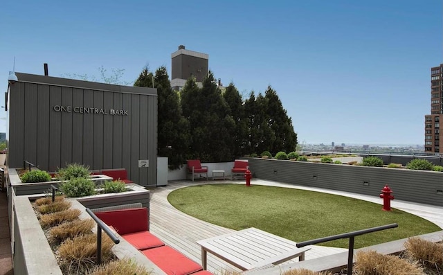 view of home's community with a garden