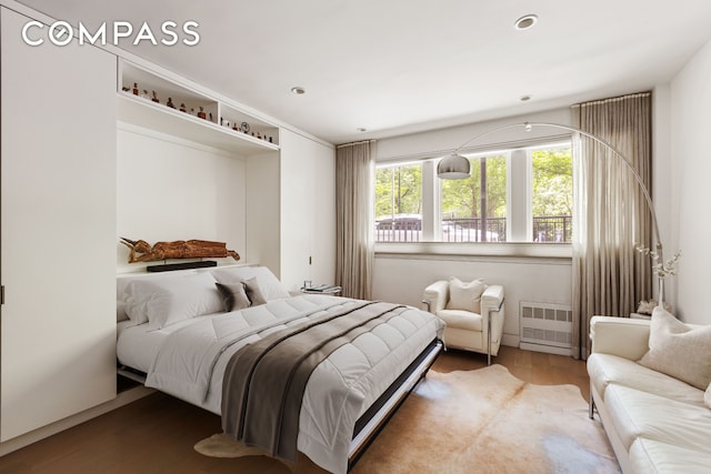 48 Gramercy Park N Unit 1A, New York City, NY 10010 - bedroom with radiator heating unit, wood finished floors, and recessed lighting