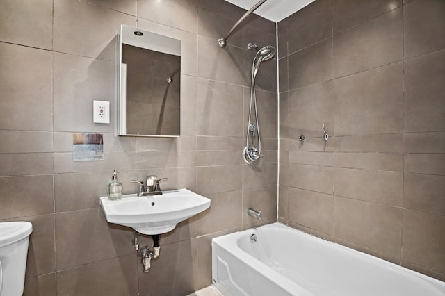 440 Greene Ave, New York City, NY 11216 - full bathroom with tile walls, toilet, and bathtub / shower combination
