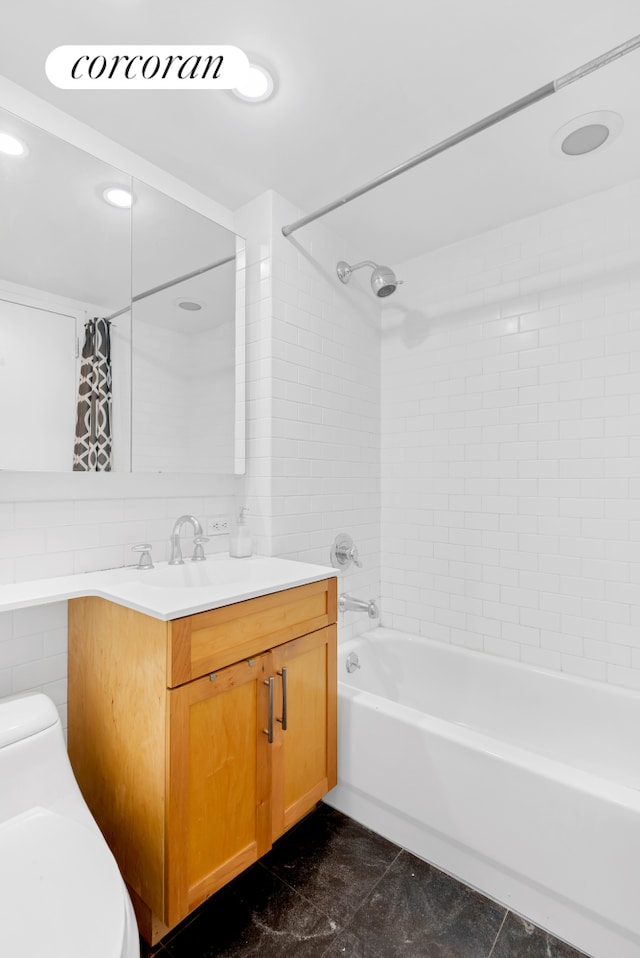 516 W 47th St Unit S4M, New York City, NY 10036 - full bath with shower / bath combination with curtain, vanity, toilet, and tile walls