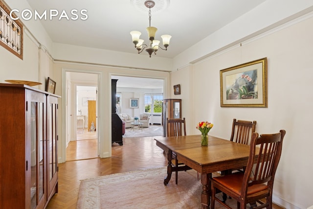 180 Cabrini Blvd Unit 54, New York City, NY 10033 - dining area with a chandelier