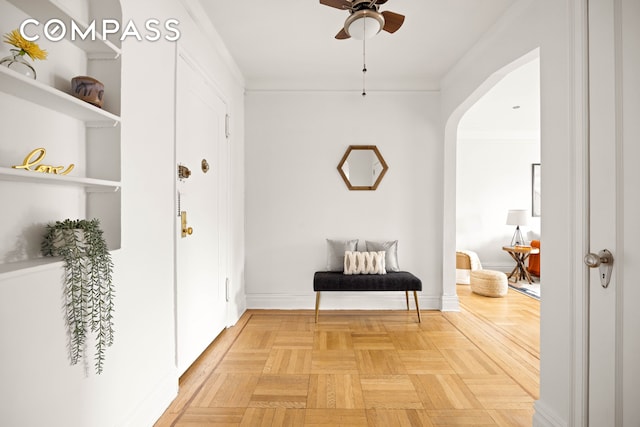 hallway featuring arched walkways
