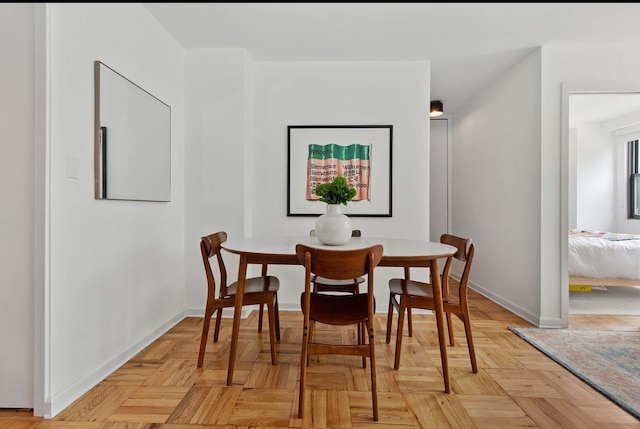 230 E 15th St Unit 3A, New York City, NY 10003 - dining room featuring baseboards