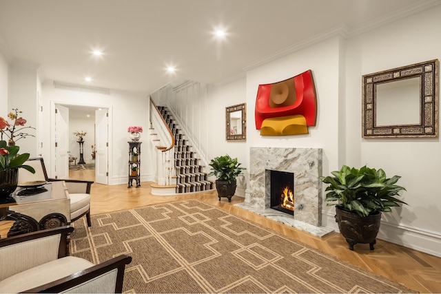 116 E 65th St, New York City, NY 10065 - living room with stairs, a premium fireplace, recessed lighting, ornamental molding, and baseboards
