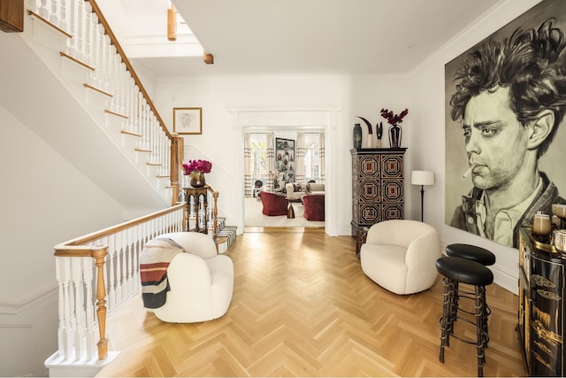 116 E 65th St, New York City, NY 10065 - living area with crown molding and stairs