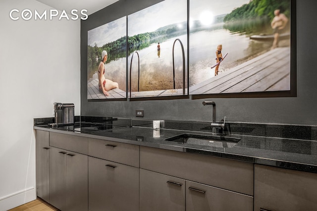 24 5th Ave Unit 824, New York City, NY 10011 - full bath featuring double vanity, a water view, and wood finished floors