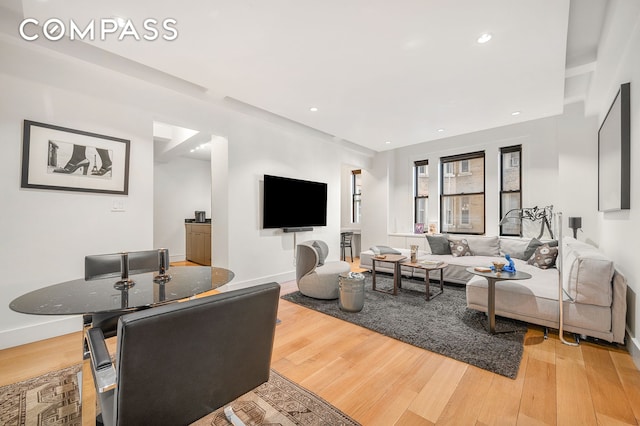 24 5th Ave Unit 824, New York City, NY 10011 - living area with light wood-type flooring, baseboards, and recessed lighting
