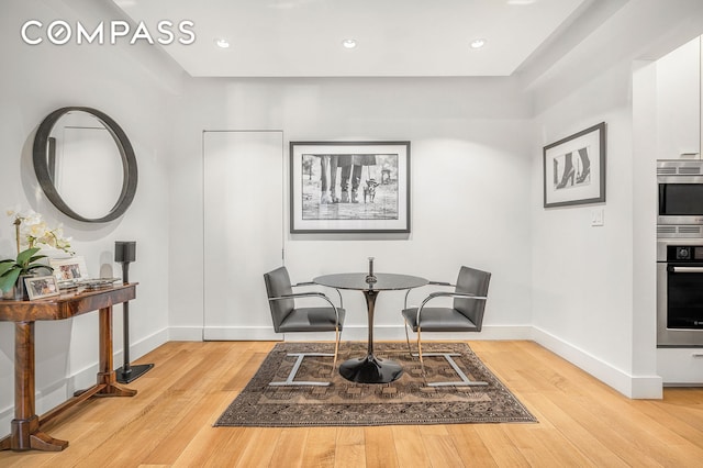 24 5th Ave Unit 824, New York City, NY 10011 - dining room featuring baseboards, light wood-type flooring, and recessed lighting
