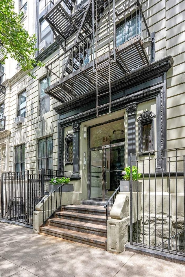 doorway to property with a balcony