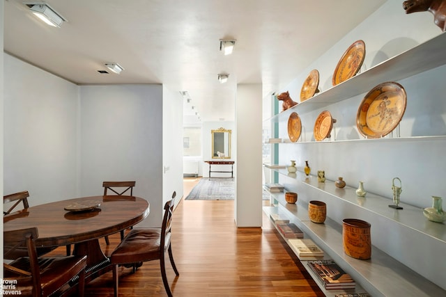 dining area featuring wood finished floors
