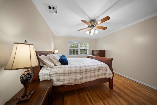 173-73 Croydon Rd, New York City, NY 11432 - bedroom with crown molding, baseboards, wood finished floors, and ceiling fan