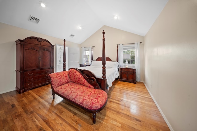 173-73 Croydon Rd, New York City, NY 11432 - bedroom featuring light wood-type flooring, baseboards, and high vaulted ceiling
