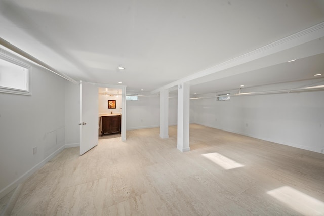 173-73 Croydon Rd, New York City, NY 11432 - below grade area with baseboards, light wood-style flooring, and recessed lighting