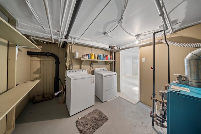 173-73 Croydon Rd, New York City, NY 11432 - finished basement featuring washer and clothes dryer and a heating unit