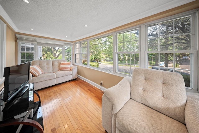 173-73 Croydon Rd, New York City, NY 11432 - sunroom / solarium with a textured ceiling, crown molding, baseboards, hardwood / wood-style flooring, and recessed lighting