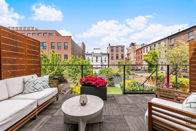 481 Macon St, New York City, NY 11233 - wooden deck featuring outdoor lounge area