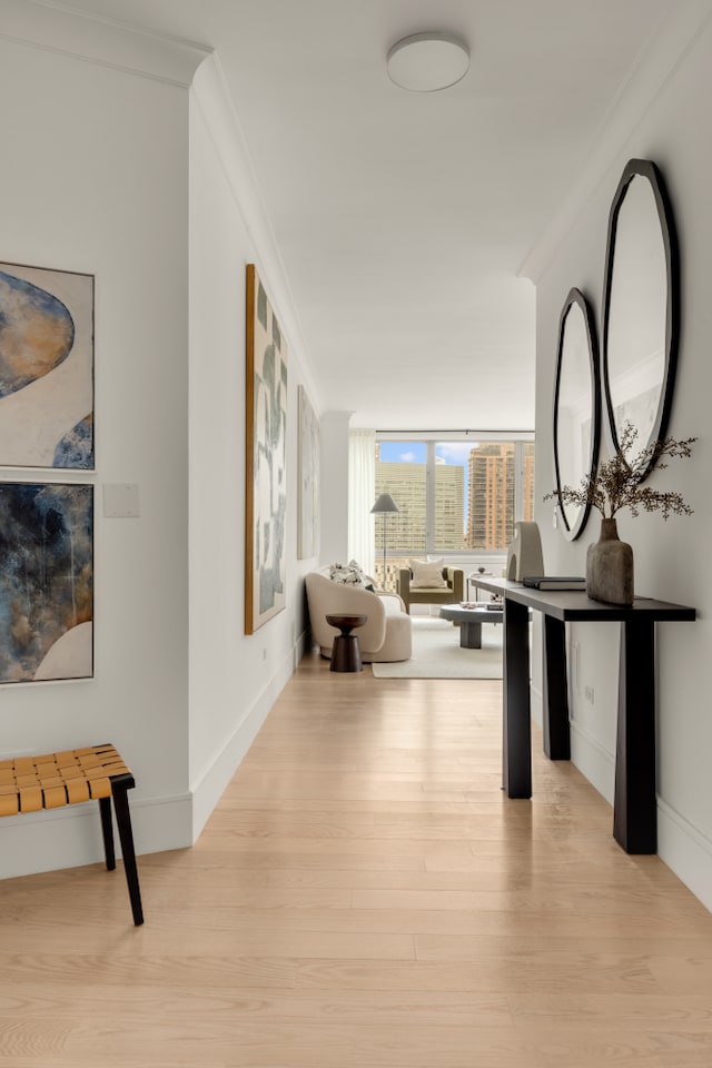 1965 Broadway Unit 20A, New York City, NY 10023 - corridor with light wood finished floors, crown molding, and baseboards