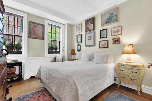 bedroom featuring dark wood-style floors