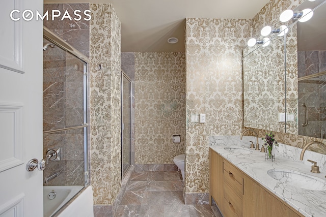 201 E 80th St Unit 16D, New York City, NY 10075 - full bath featuring a tile shower, a tub to relax in, double vanity, toilet, and marble finish flooring