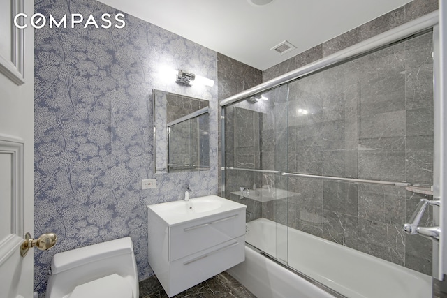 201 E 80th St Unit 16D, New York City, NY 10075 - full bath with toilet, vanity, enclosed tub / shower combo, and marble finish flooring