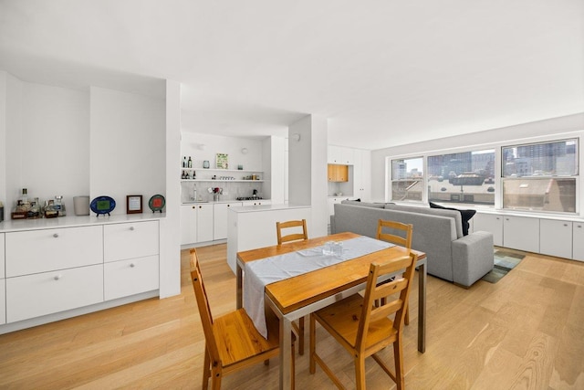 dining room featuring light wood-style flooring