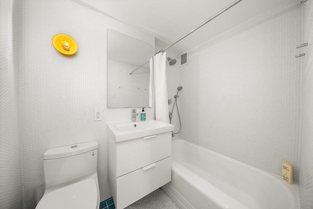 full bath featuring toilet, shower / bath combination with curtain, and vanity