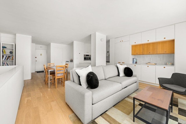 living area featuring light wood finished floors
