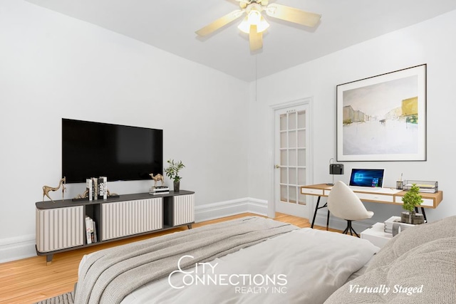 223 E 50th St Unit 2-C, New York City, NY 10022 - bedroom featuring wood finished floors, an office area, and ceiling fan