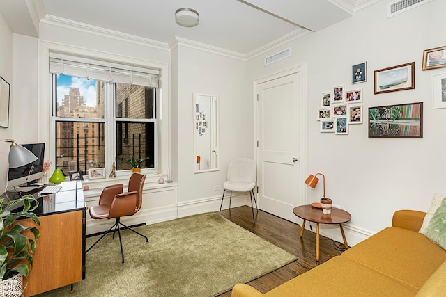office area featuring wood finished floors, crown molding, and baseboards
