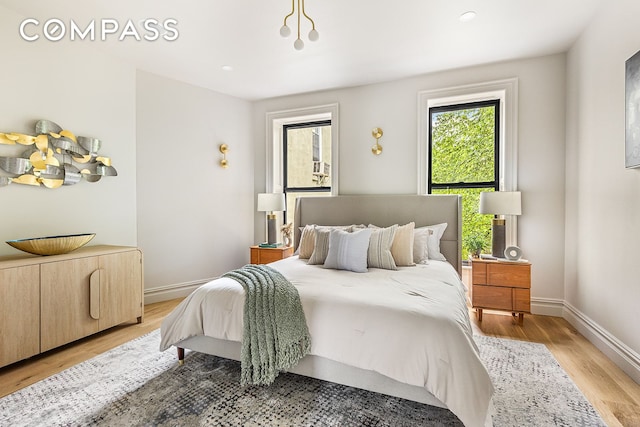 370 Hancock St, New York City, NY 11216 - bedroom with light wood finished floors and recessed lighting