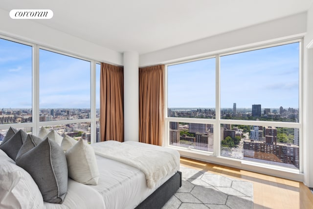 2628 Broadway Unit 34A, New York City, NY 10025 - bedroom featuring a city view and wood finished floors