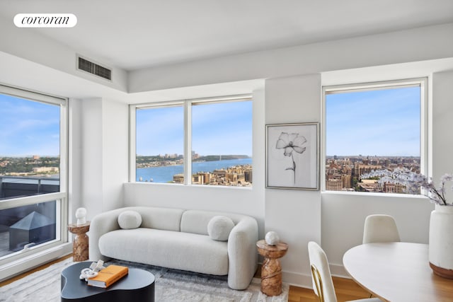 2628 Broadway Unit 34A, New York City, NY 10025 - living area featuring wood finished floors and a water view