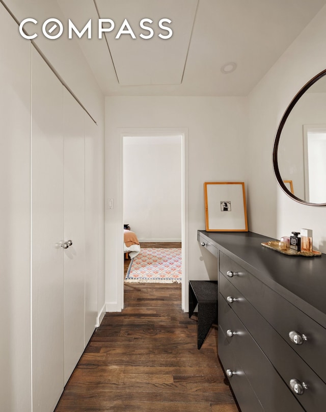 115 4th Ave Unit 2I, New York City, NY 10003 - corridor with dark wood finished floors and attic access