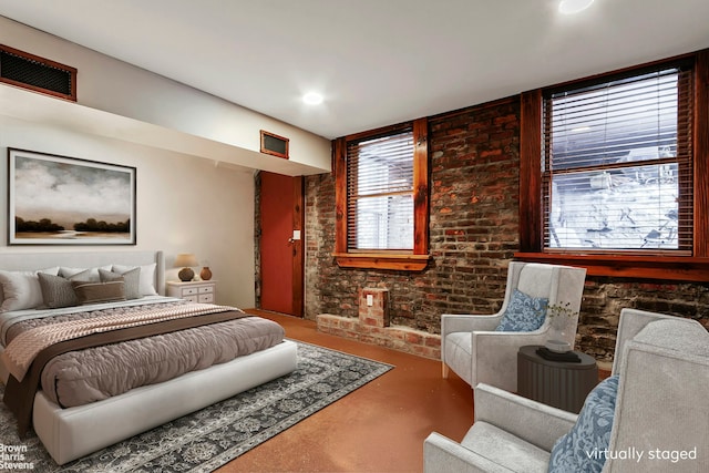 301 Water St, New York City, NY 11201 - bedroom with concrete floors and brick wall