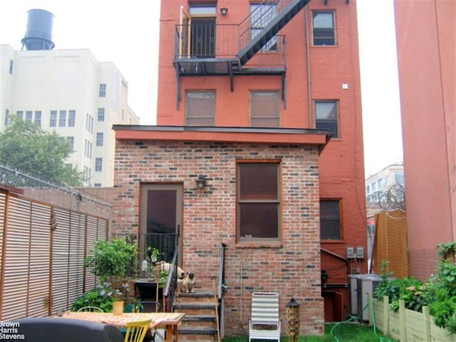 301 Water St, New York City, NY 11201 - rear view of house featuring brick siding
