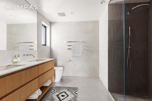 96 N 1st St Unit 3A, New York City, NY 11249 - full bathroom featuring walk in shower, double vanity, and toilet